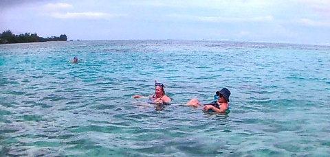 Ilene & Patty paddling in the ocean