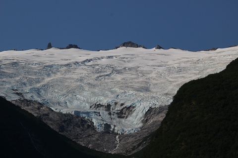 glacier spilling over mountain